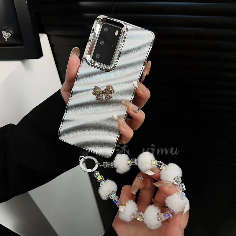 适用华为p40pro手机壳新款p40套huawei高级电镀皮纹波浪蝴蝶结女p