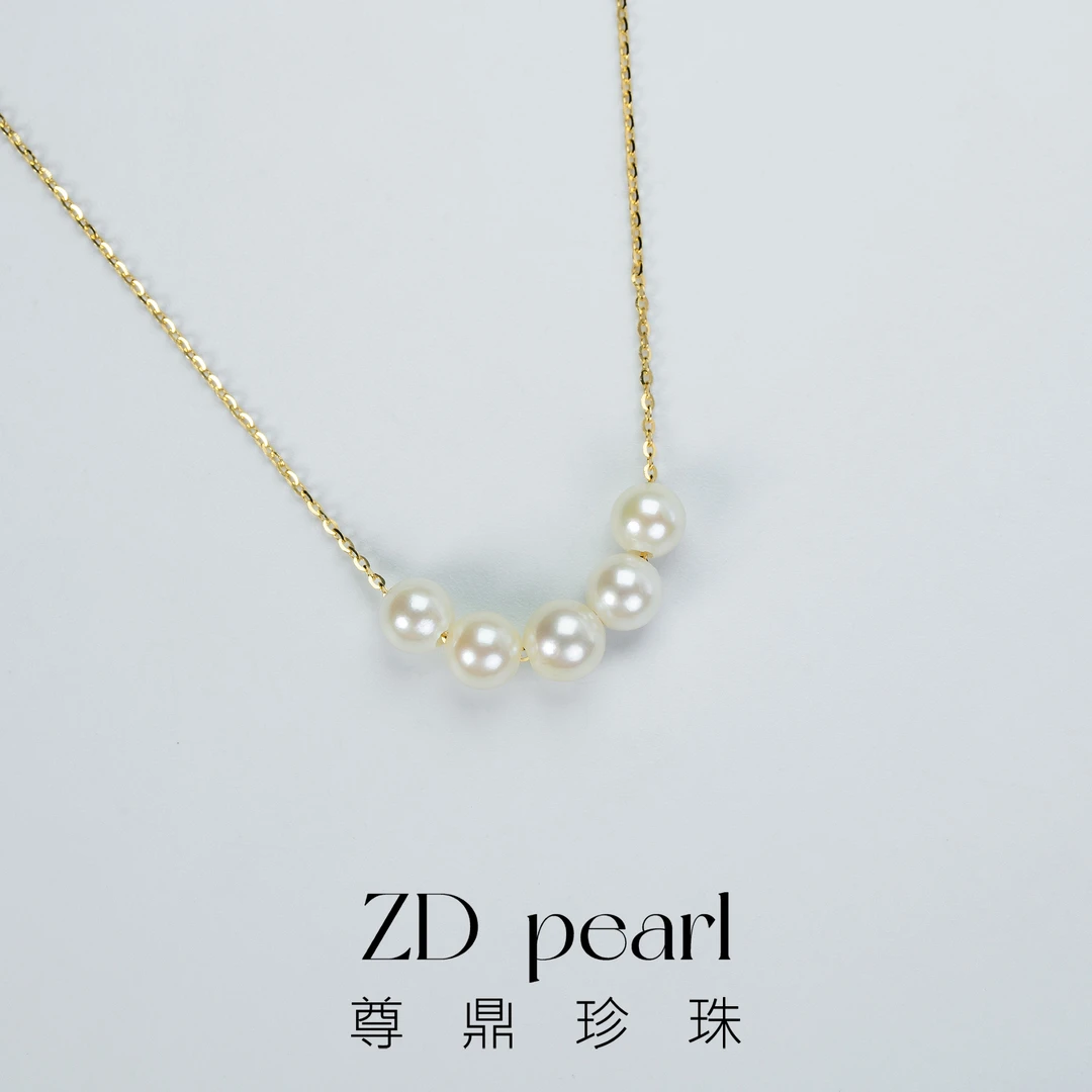 尊鼎珍珠-S925银镀金海水羽黄金微笑链KZ 5-6mm