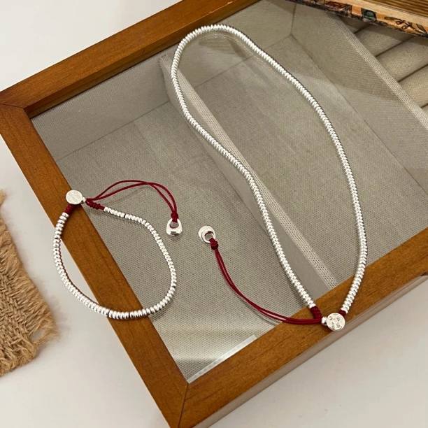 925银手链 小众设计师款高级感米粒路路通平安喜乐福袋红绳手链