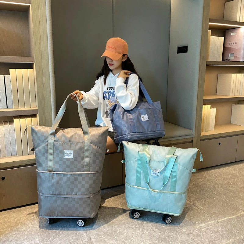 新款万向轮旅行包升级面料扩大容量多功能轮子旅行包旅行袋滚轮包