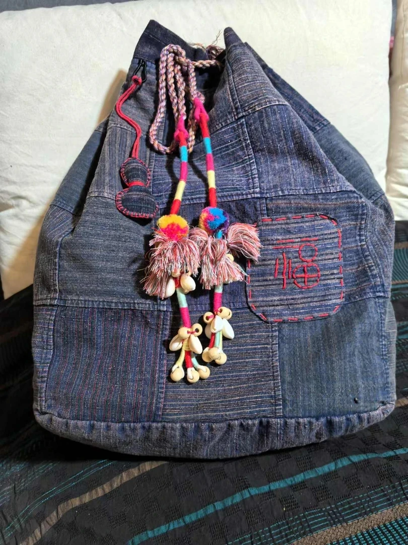 東森家设计师新款老布双肩背包