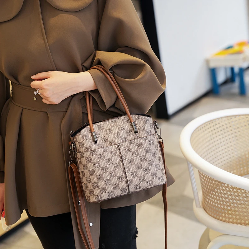 【魅】厂家手提包女2023新款潮时尚单肩斜挎包大容量隔层水桶包