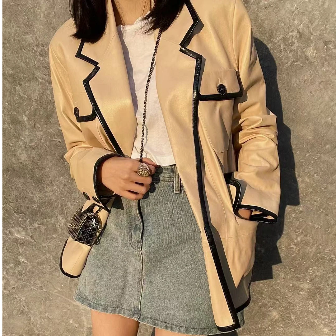 99新 Chanel/香奈儿 沙滩系列 36码米黄色拼黑色边四口袋皮衣外套