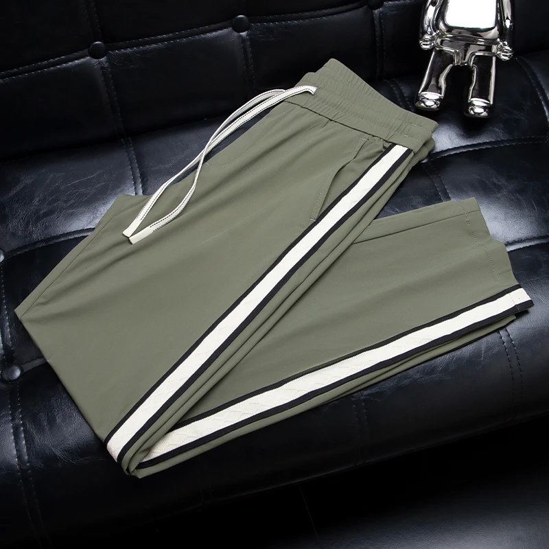 欧洲站夏季薄款冰丝凉感休闲运动裤男修身时尚织带拼接直筒裤男士