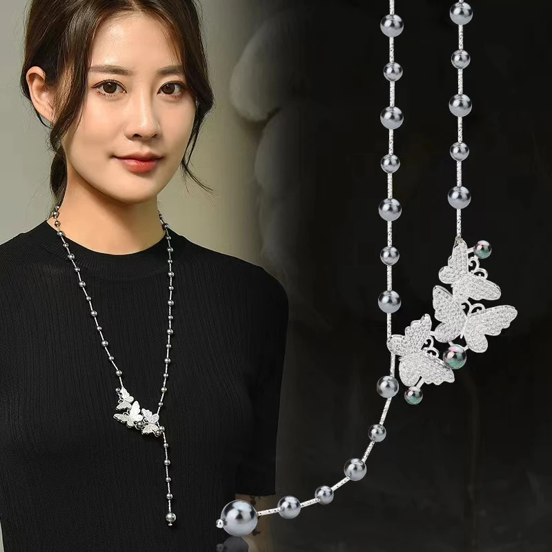 非金属仿珍珠项链 灰色施家珠蝴蝶流苏毛衣链M042