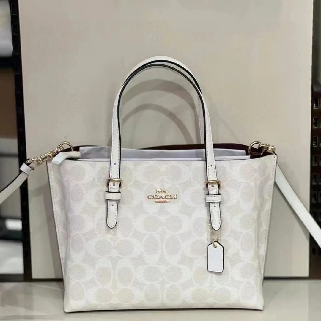 全新未使用 COACH/蔻驰 冰川白小号手提托特茉莉包