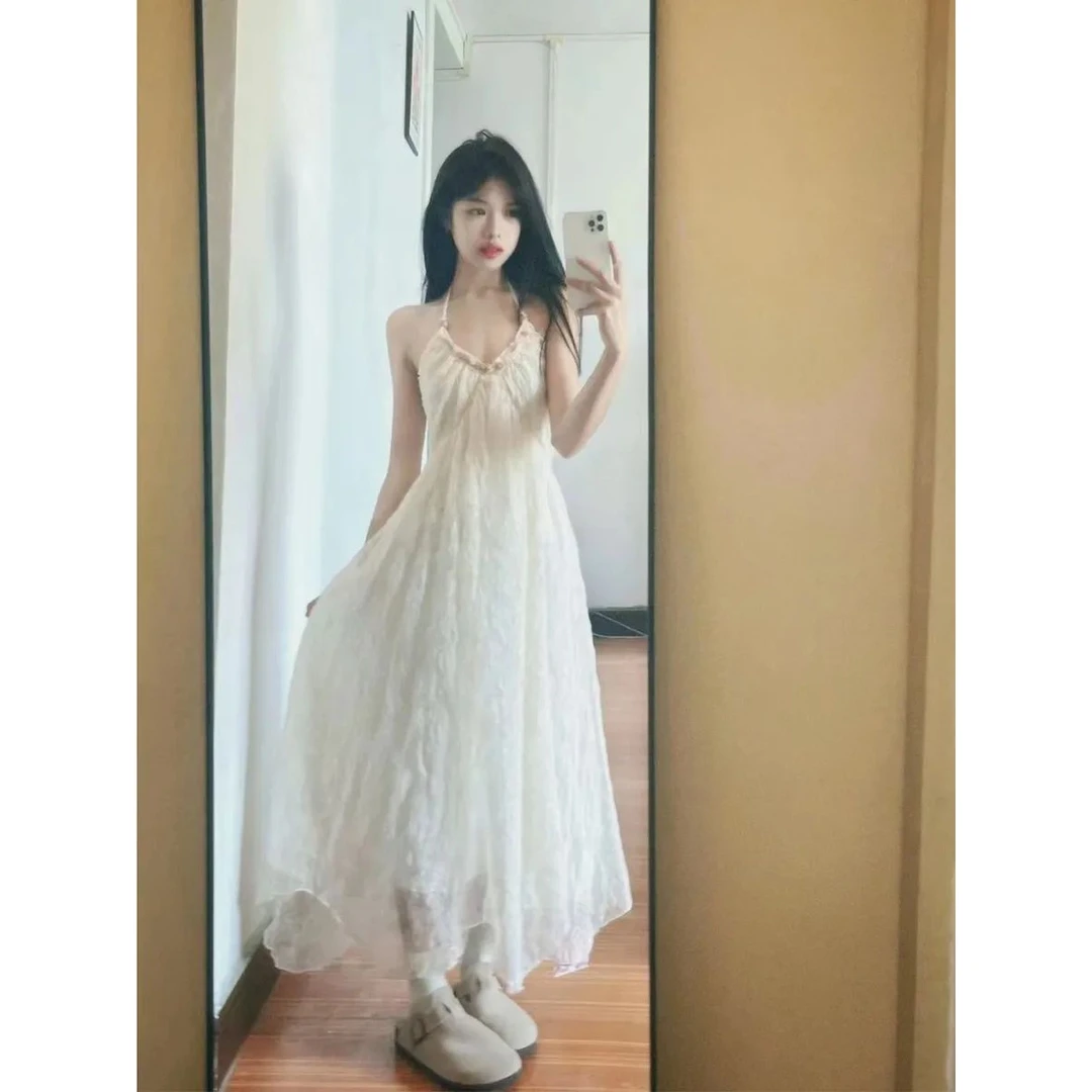 法式海边沙滩裙夏季新款纯欲大露背挂脖吊带长裙女绑带超仙连衣裙