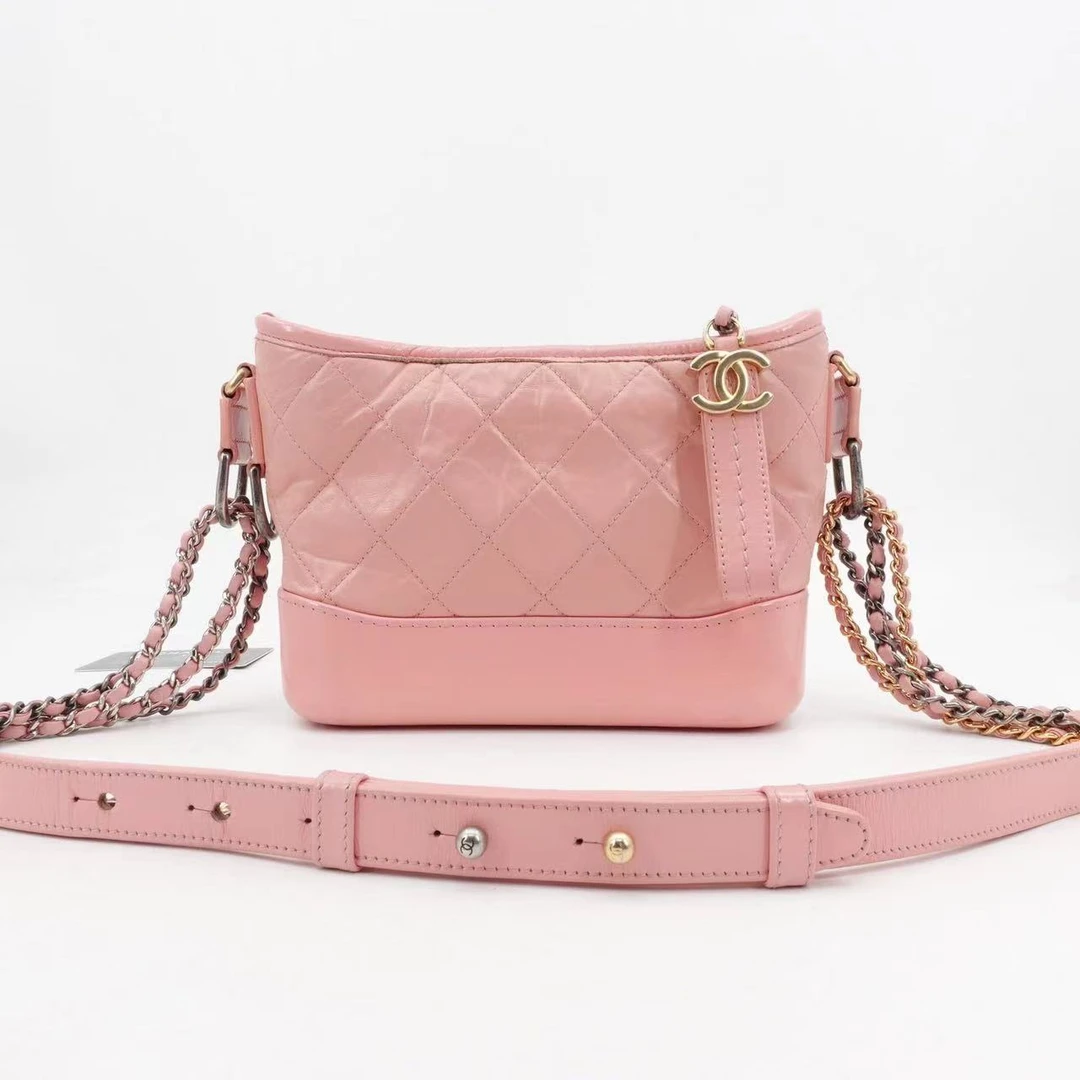 95新 Chanel/香奈儿 流浪包小号粉色金扣油蜡牛皮27开/32621459