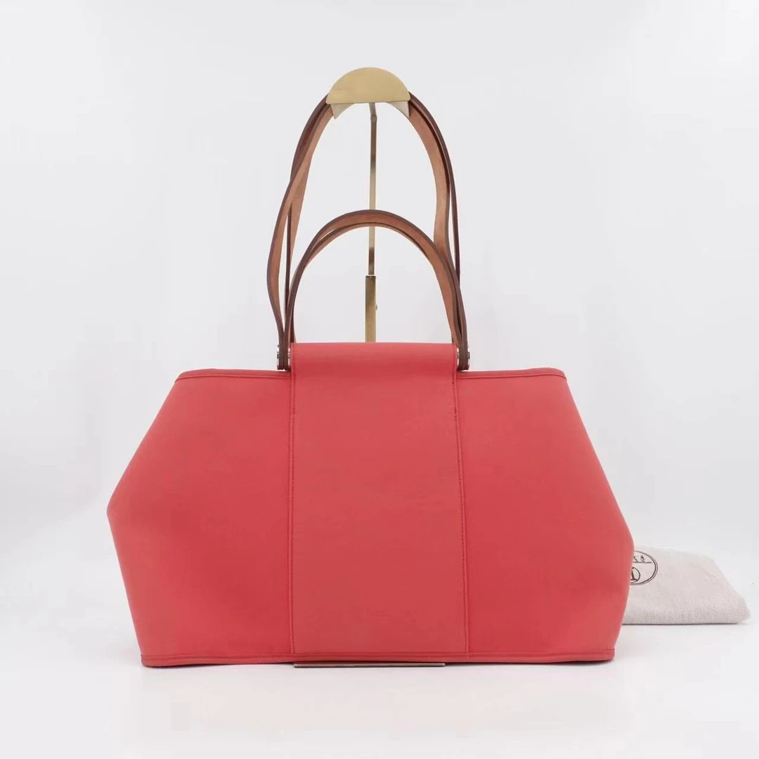 95新 Hermes/爱马仕 Cabag38唇膏粉银扣帆布拼皮/手提包/54412928
