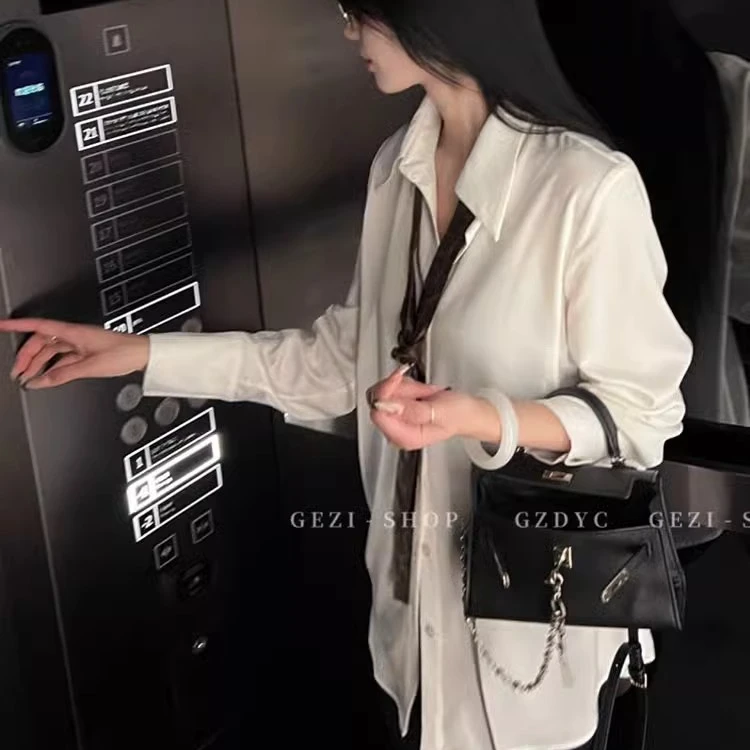 气质简约polo领白色长袖衬衫女2024新款设计感慵懒宽松休闲上衣