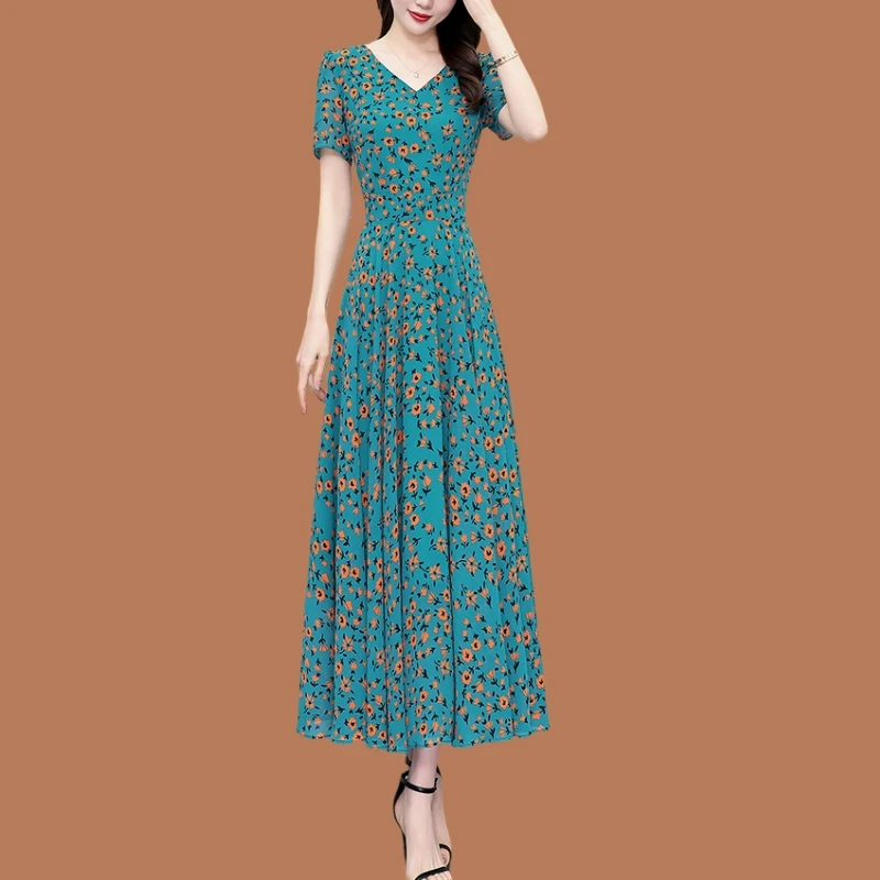 广州十三行裙子绿色真丝连衣裙2025新款夏季短袖长款显瘦大摆长裙