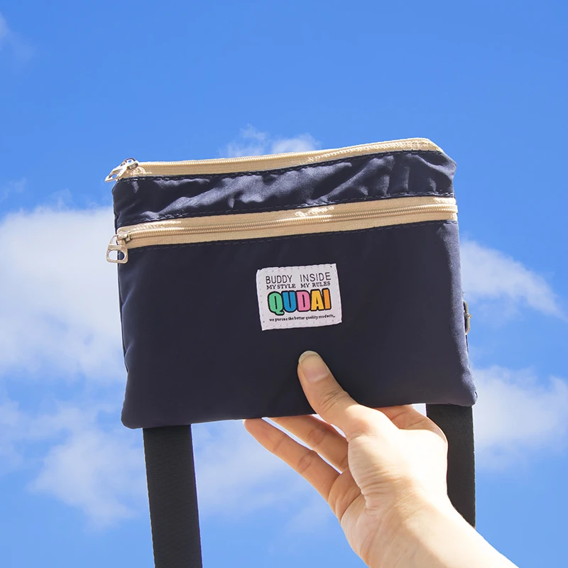 百搭手机小斜挎包包2025新款潮夏季韩版简约拉链迷你布包斜挎小包