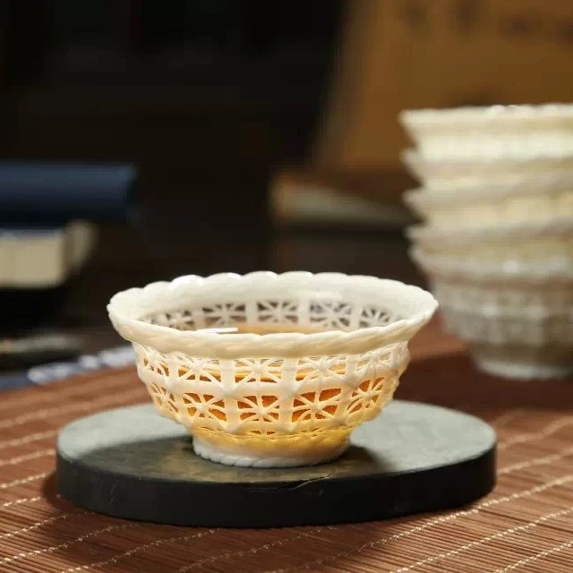 创意陶瓷手编茶具 镂空玲珑品茗茶杯 白度柔和 透明镂空设计