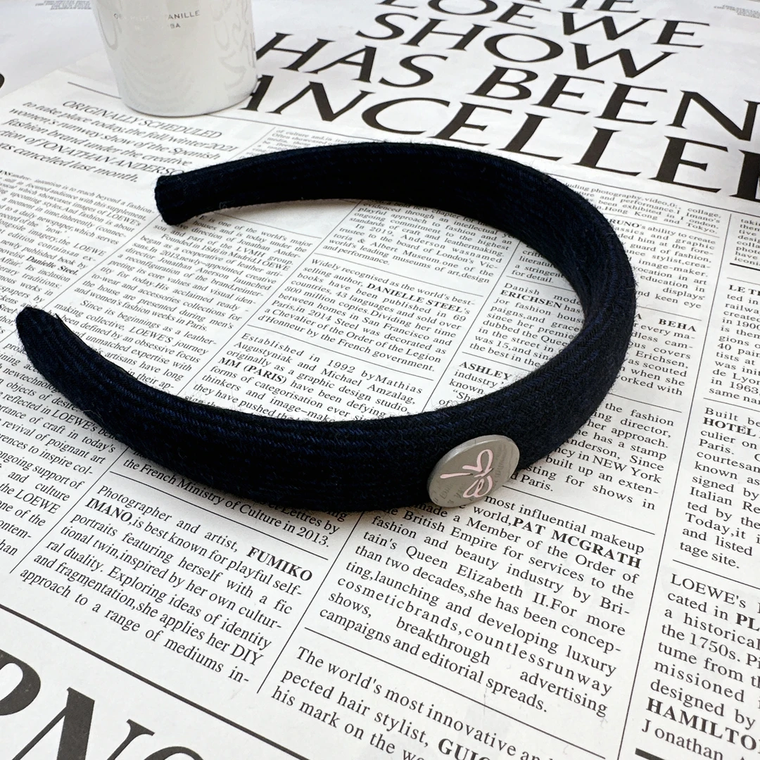 Mi33 韩版饰品 蝴蝶结条纹发箍 F09059028