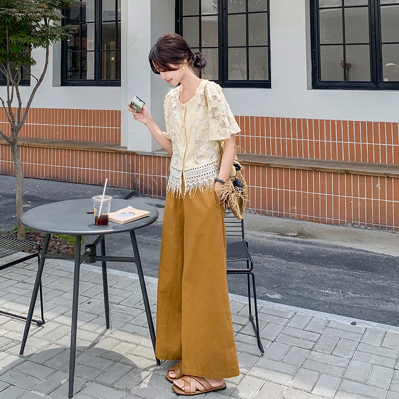 高端镂空蕾丝新款短袖上衣多巴胺流行阔腿不撞款裤套装设计2024夏