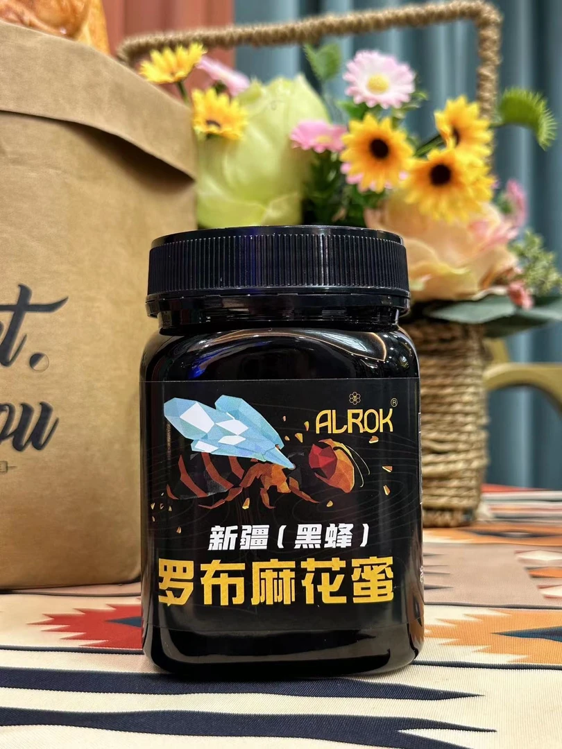 لوپنۇر كەندىر  گۈلى ھەسىلى 新疆黑蜂罗布麻花蜜一瓶1000克