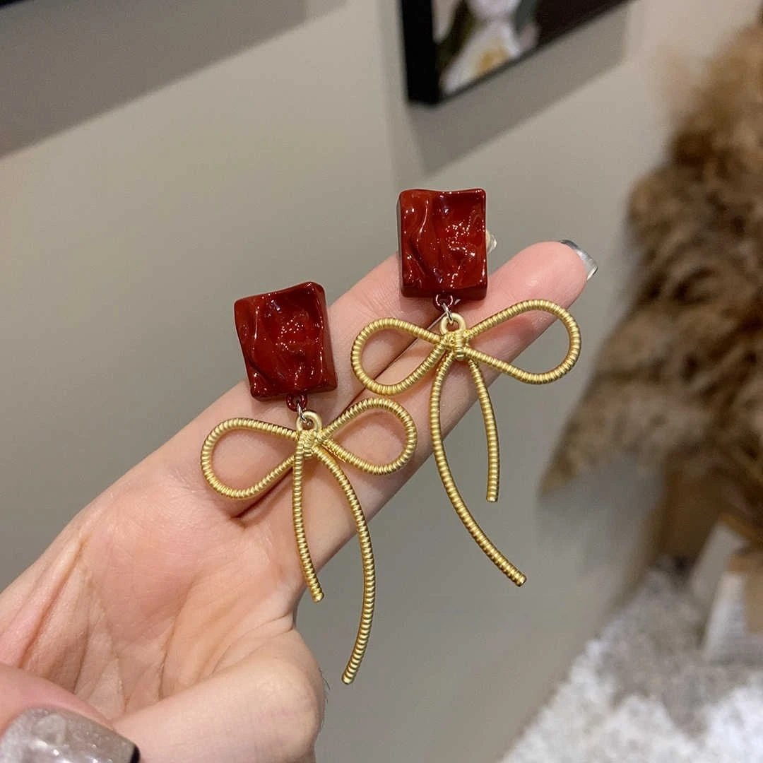 铜合金耳饰 蝴蝶结长款流苏耳环女个性日韩显脸瘦超仙网红耳饰