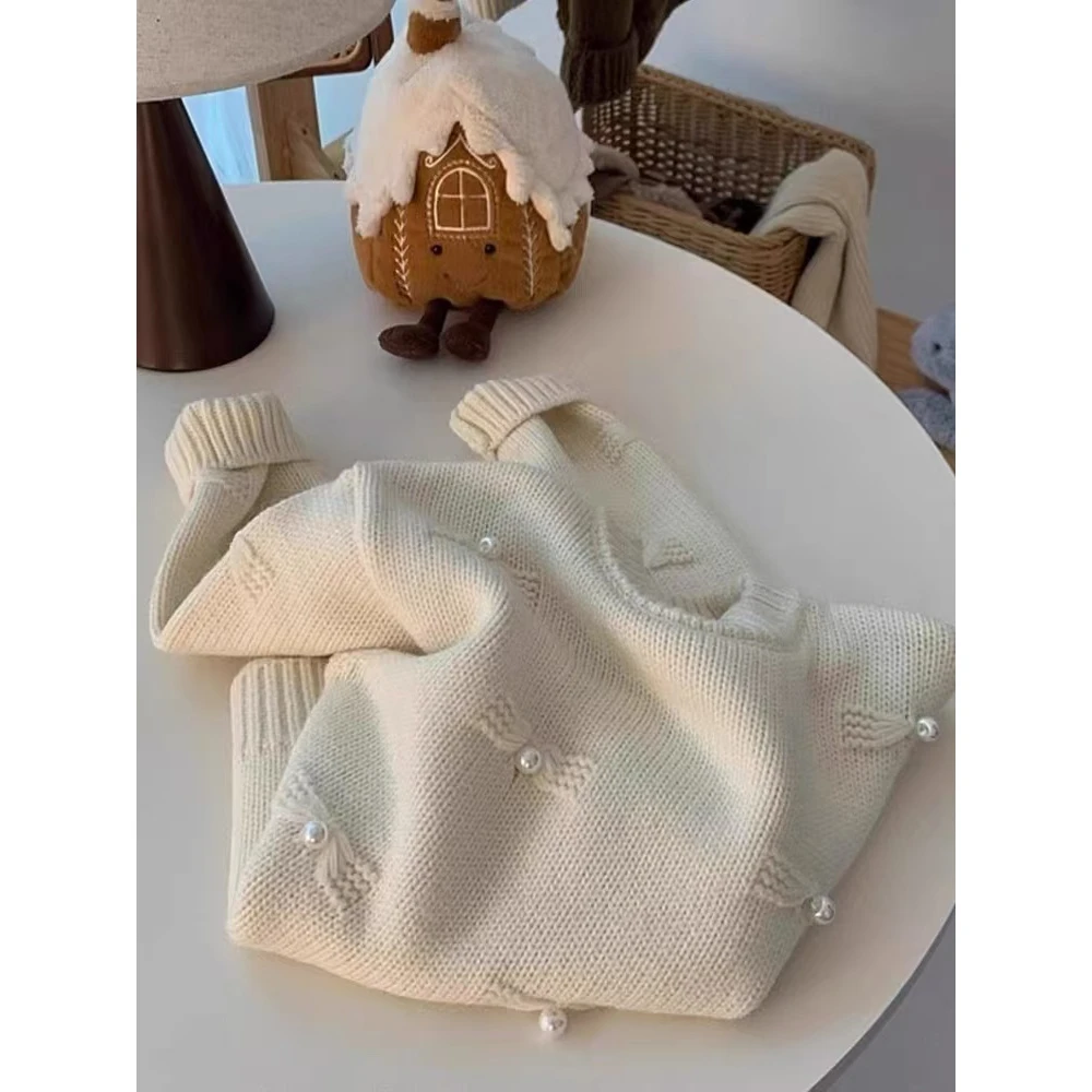 小清新高端早秋冬季2025新款女装高级感穿搭上衣白色百搭毛衣欧货