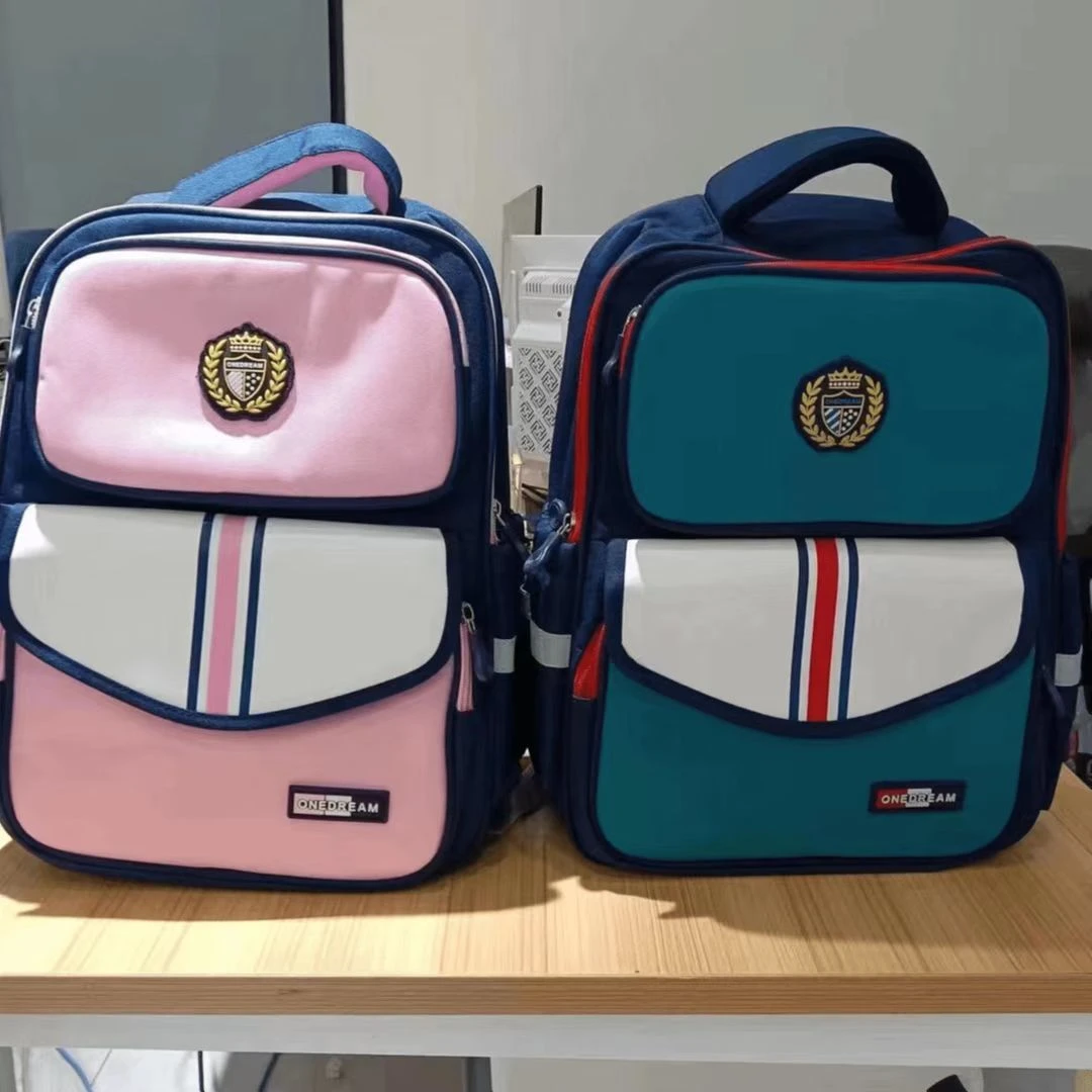 新款英伦儿童学生书包1-3-6年级男女童高颜值耐磨减负校园双肩包