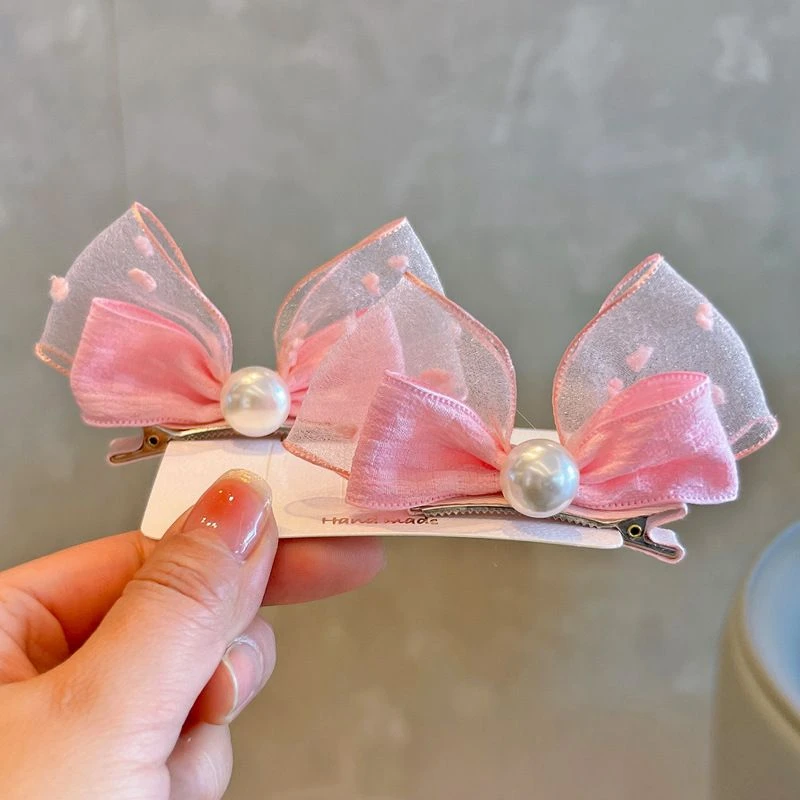 粉色小清新春季泡泡纱女孩儿立体蝴蝶结公主儿童对夹女童发饰