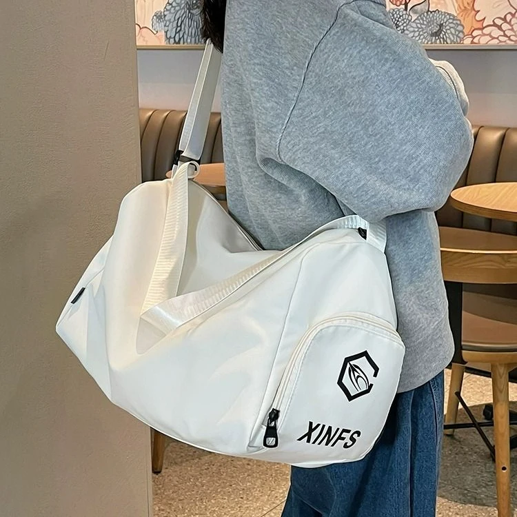 日系大容量斜挎包女高级感健身运动背包短途旅行包潮男手提单肩包