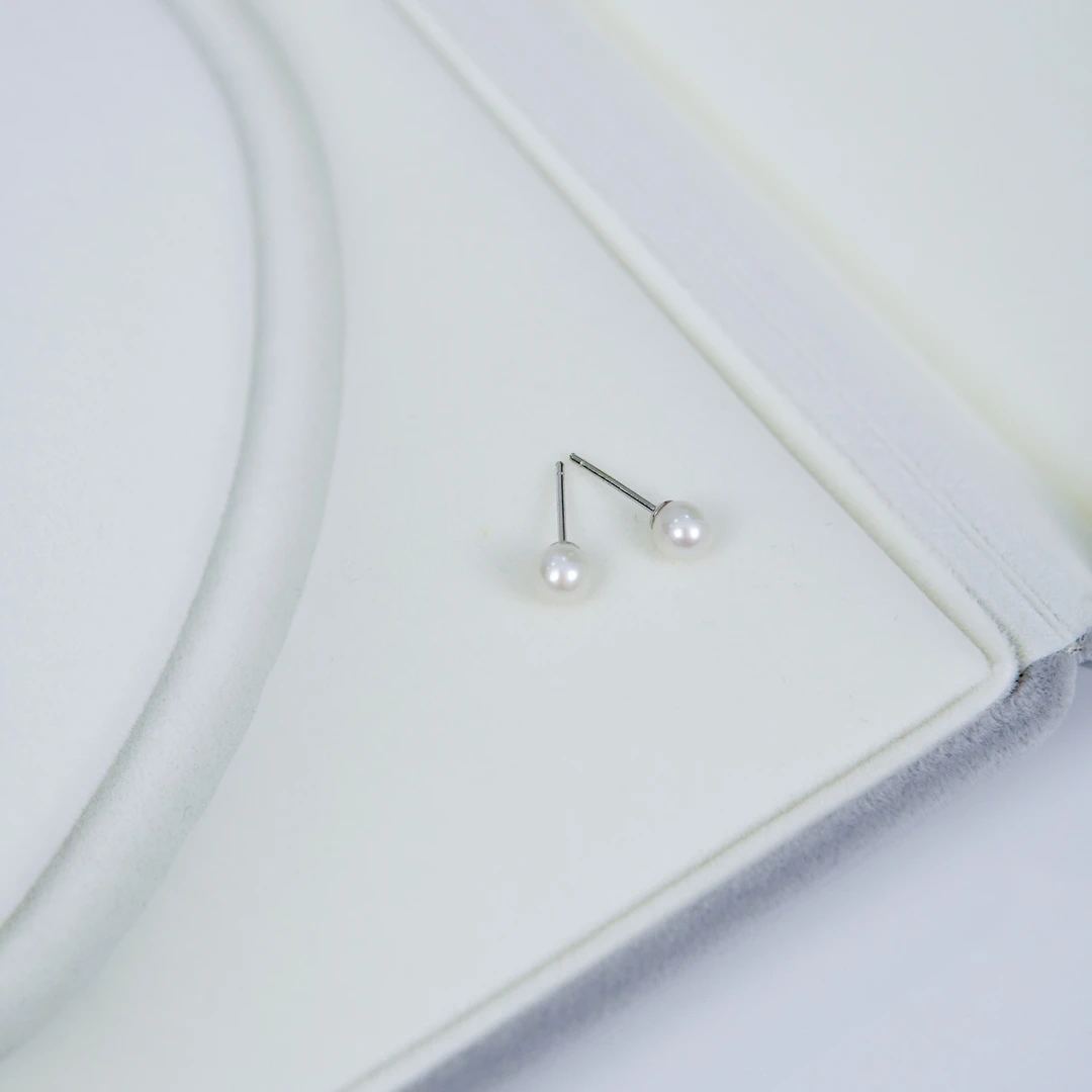 优雅6-7mm小点位淡水珍珠耳钉925银正圆白色极光高亮经典时尚百搭
