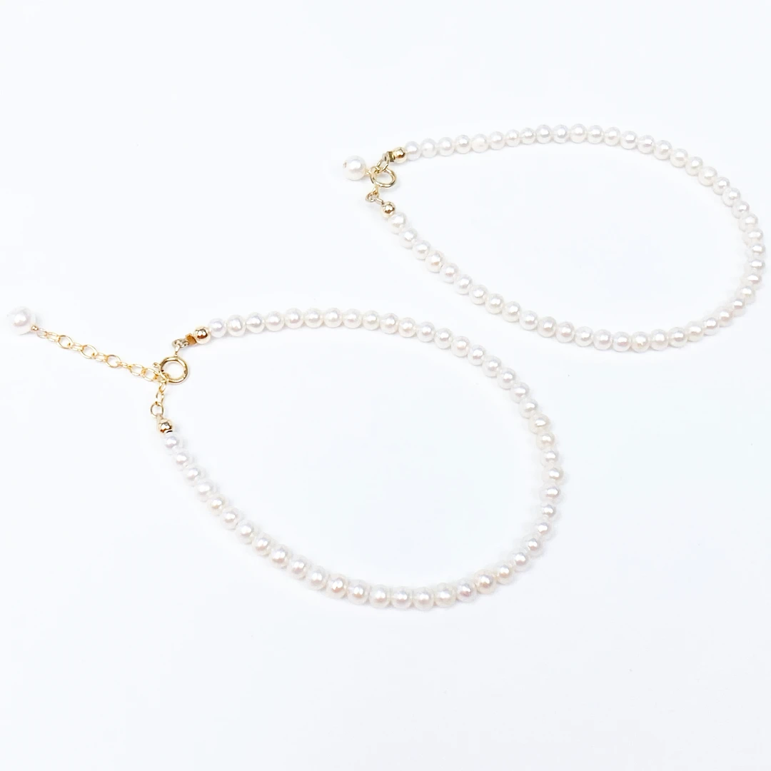 淡水珍珠手链镜面极光近正圆4-5mm小米珠注金5%黄金弹簧扣不褪色