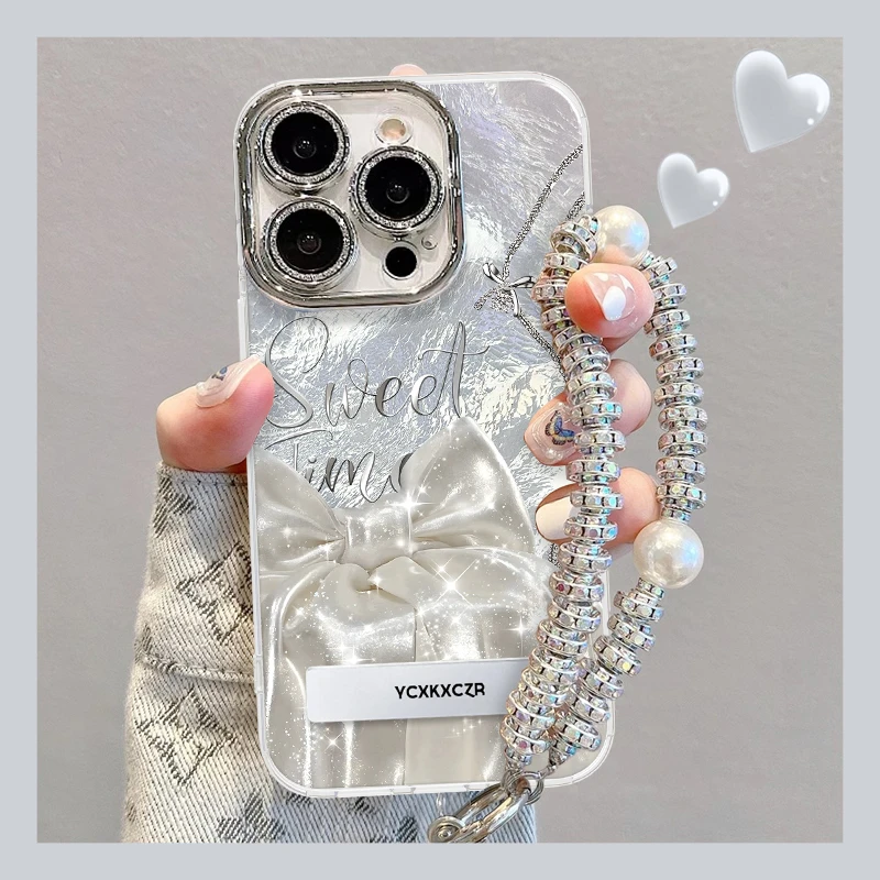 网红蝴蝶结适用于苹果15冰川纹手机壳oppo华为vivo流行松弛感时尚