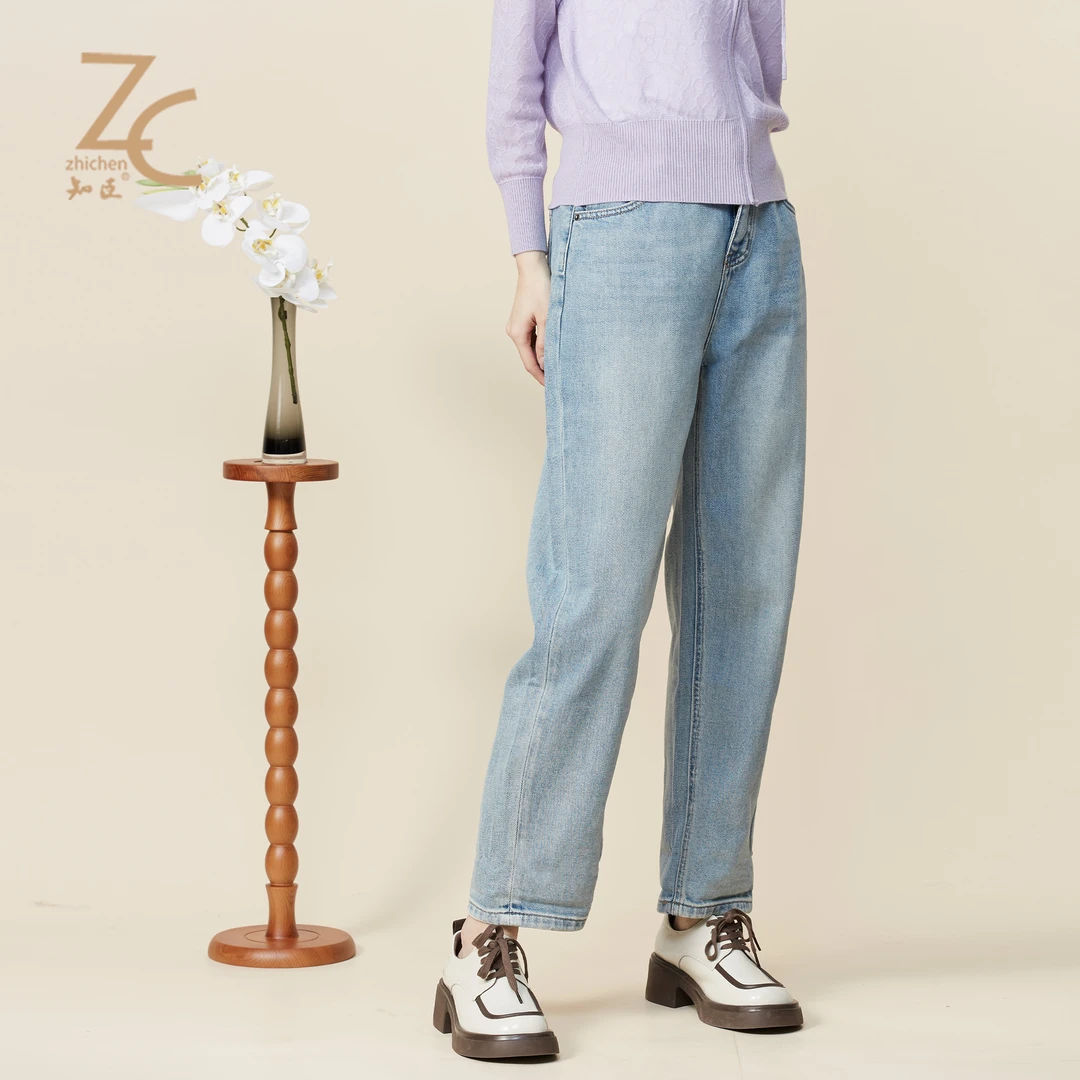 知臣春季新品 遮肉翻边时尚显瘦浅蓝哈伦牛仔裤女 T24861041