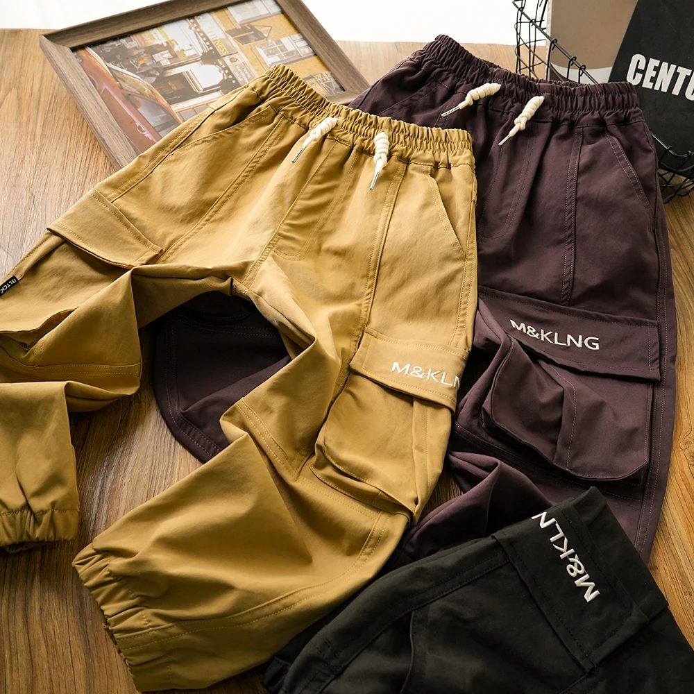 男童儿童秋季新款字母刺绣口袋拼接工装裤中大童抽绳裤子37058