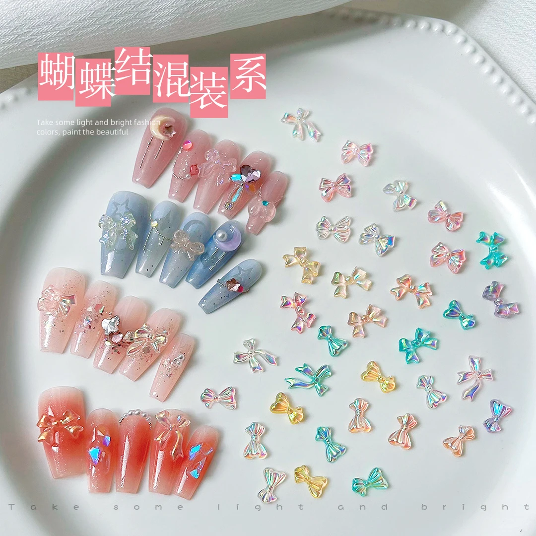 美甲混装极光蝴蝶结小熊饰品立体幻彩冰透树脂混装指甲饰品钻批发