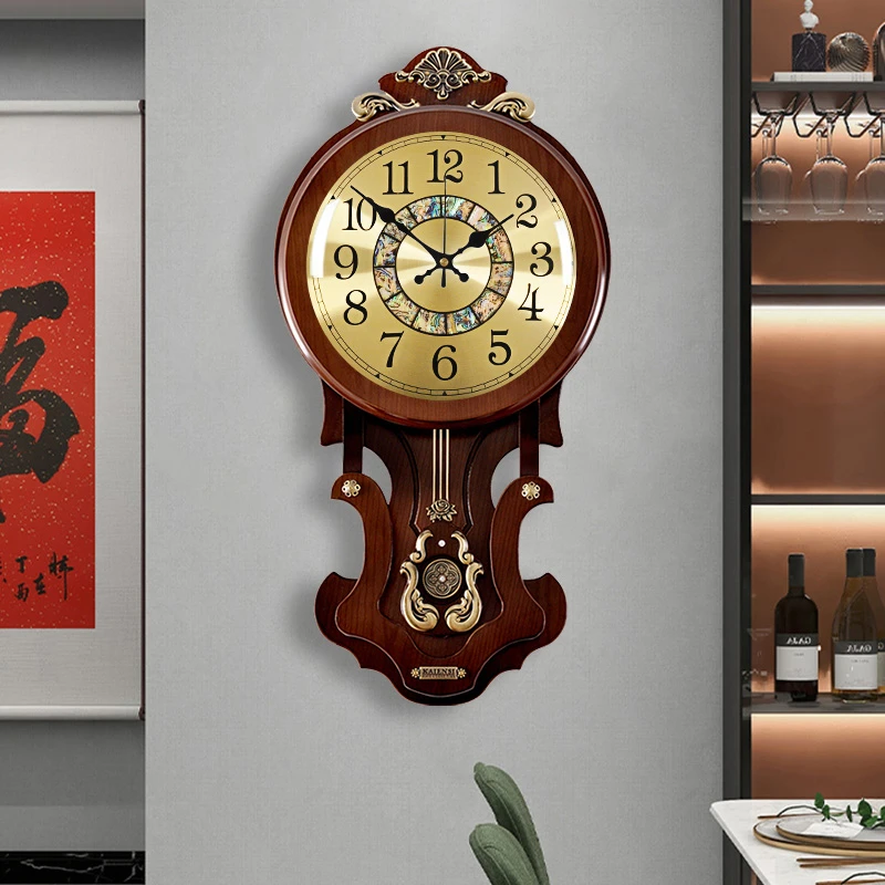 创意贝壳挂钟时尚轻奢摆钟静音时钟中式家用客厅挂钟钟表挂墙