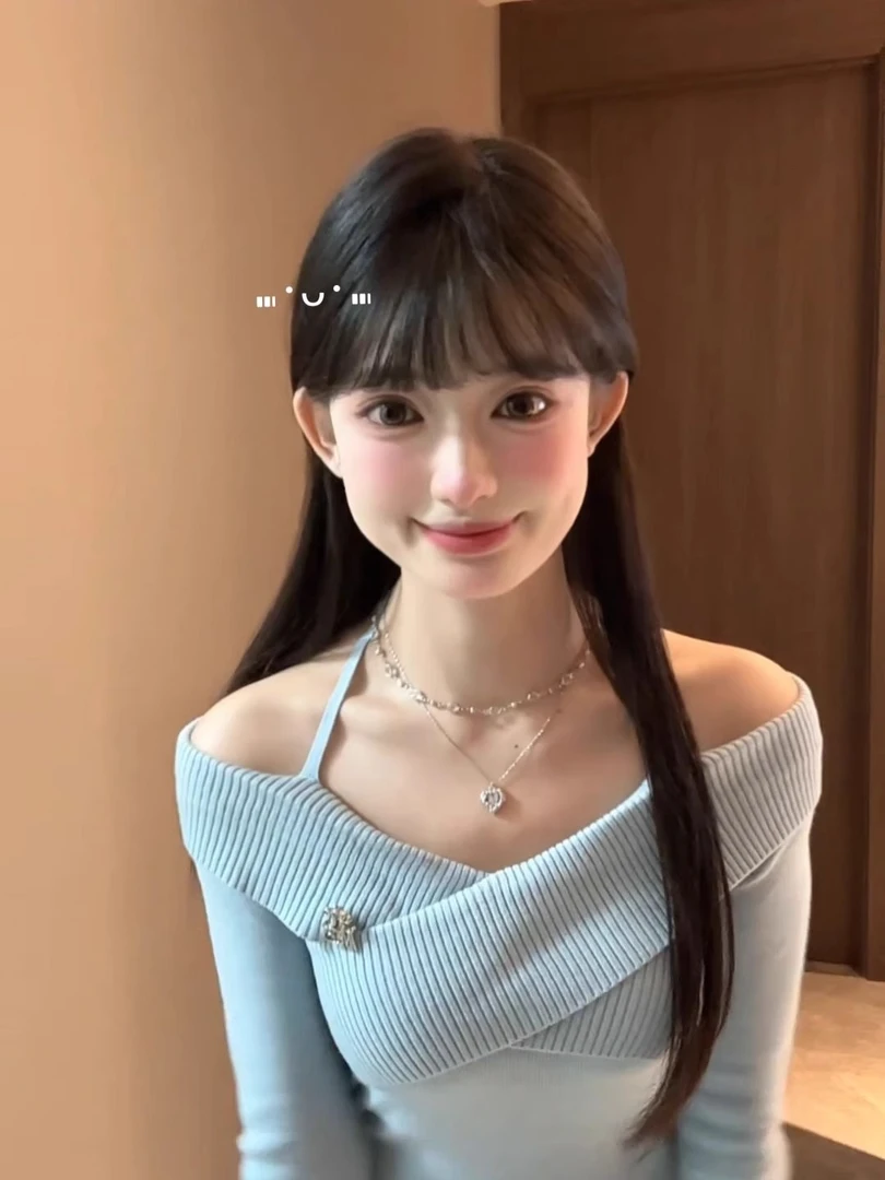 韩系蓝色一字肩挂脖针织衫女秋季设计感小众交叉修身显瘦短款上衣