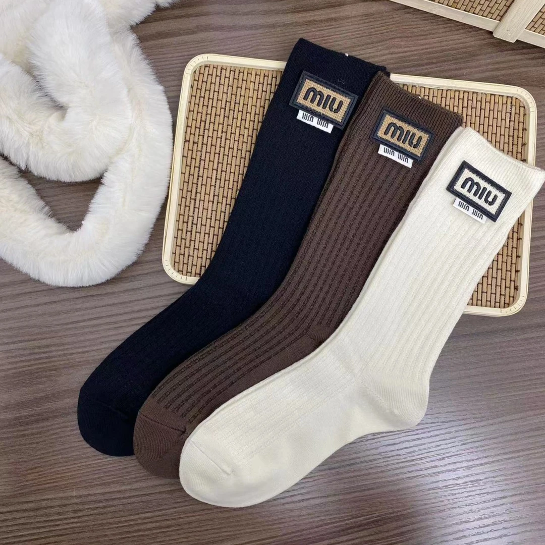 兔绒袜 秋冬新款纯色布标字母外穿时尚保暖兔绒高筒女袜