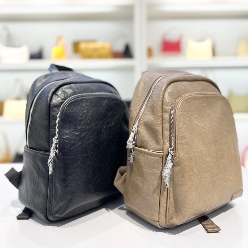 新款欧米专柜正品OMI女包运动休闲双肩包时尚简约背包旅行背包