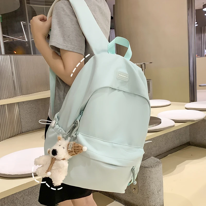 小清新书包女高中大学生双肩包大容量初中小学生纯色可爱旅行背包
