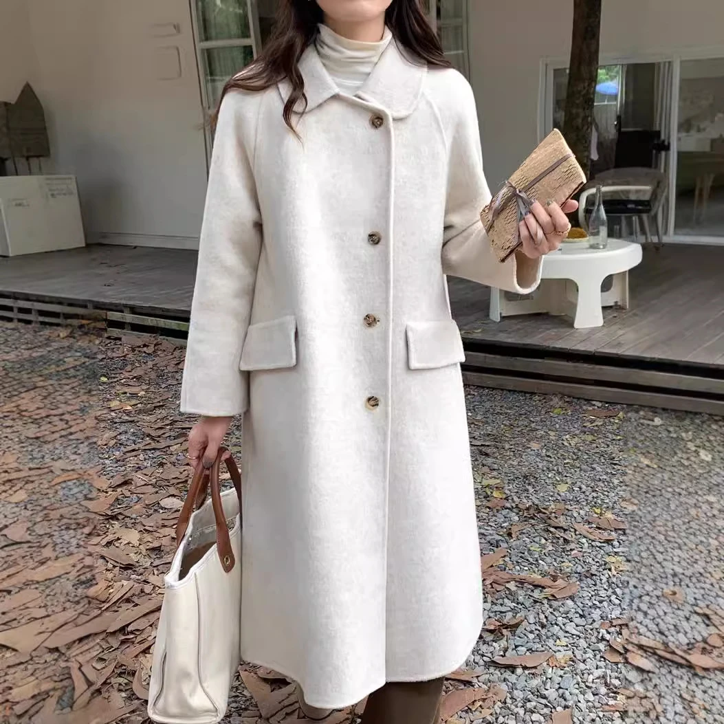 韩版减龄少女风娃娃领单排扣毛呢外套百搭粉色手缝羊绒大衣女