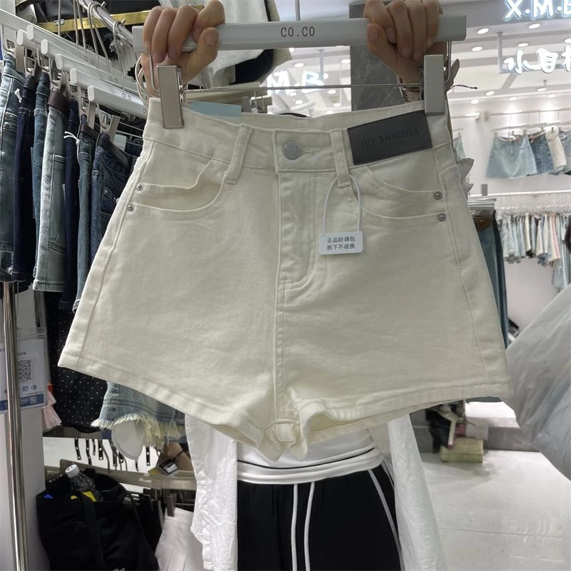 个性皮标牛仔短裙短裤女夏季新款杏色百搭显瘦辣妹a字阔腿热裤