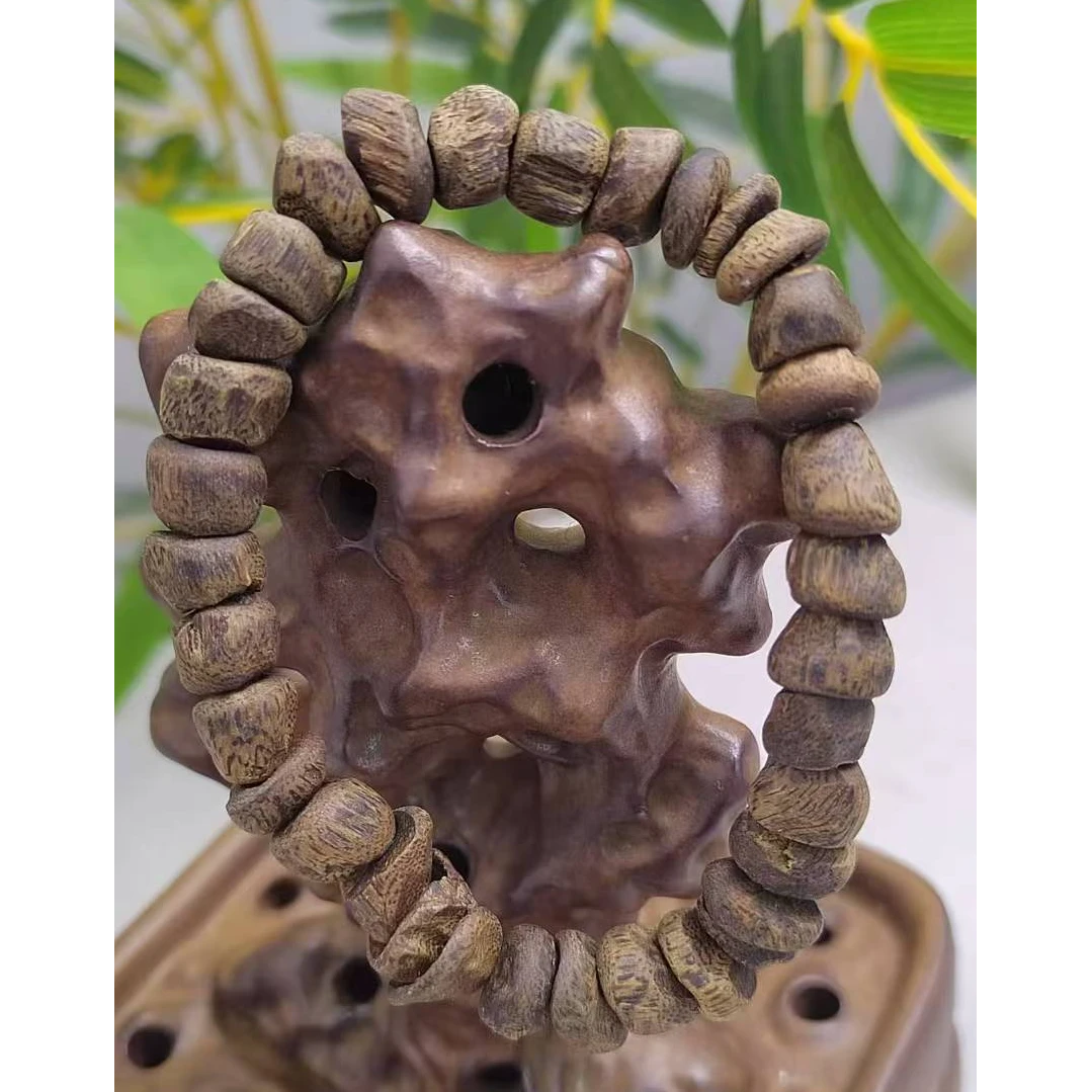 莺歌绿棋楠沉水虫漏树盯单圈手串9mm11克