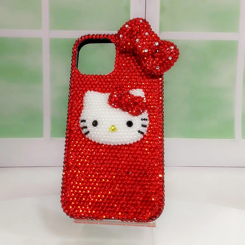 适用iPhone11121314promax苹果红色水钻KT猫头圆蝴蝶结手机壳防摔