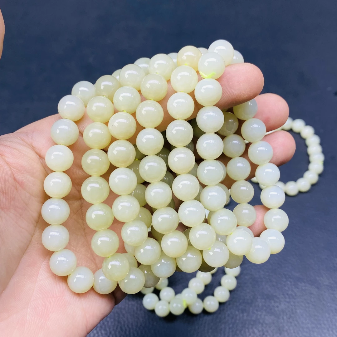 新疆和田玉且末近矿料黄白种卡10手串纯天然