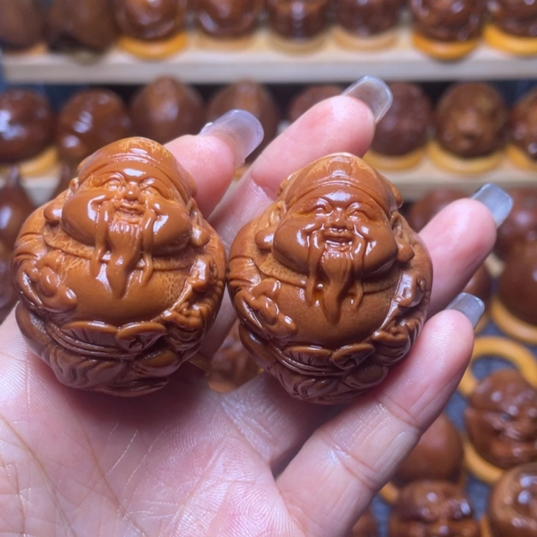 【闪购商品】橄榄核雕心**。