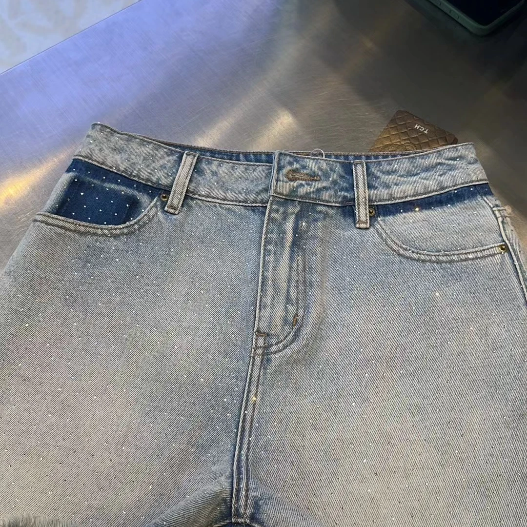 重庆TCH轻奢潮牌满天星牛仔短裤T72B218006