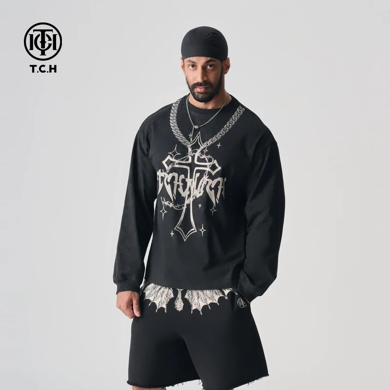 唐山万达-新款烫钻宽松长袖T恤经典系列T72A086008