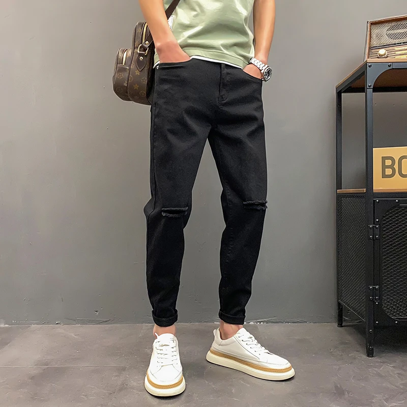 春季黑色牛仔裤男膝盖一字破洞潮牌韩版潮流修身小脚九分男士裤子