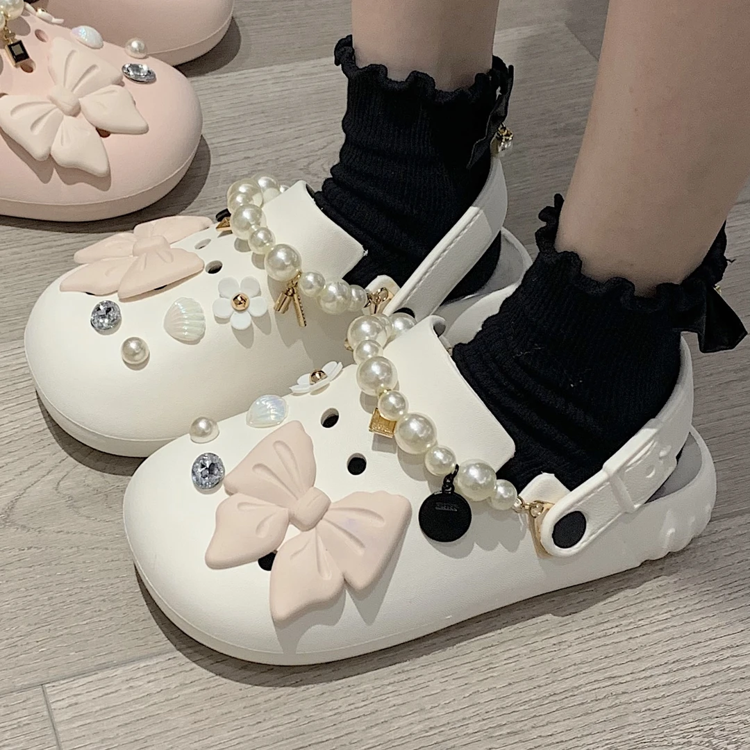 甜美公主风珍珠蝴蝶结洞洞鞋eva防臭防滑时尚外穿镂空沙滩鞋女夏