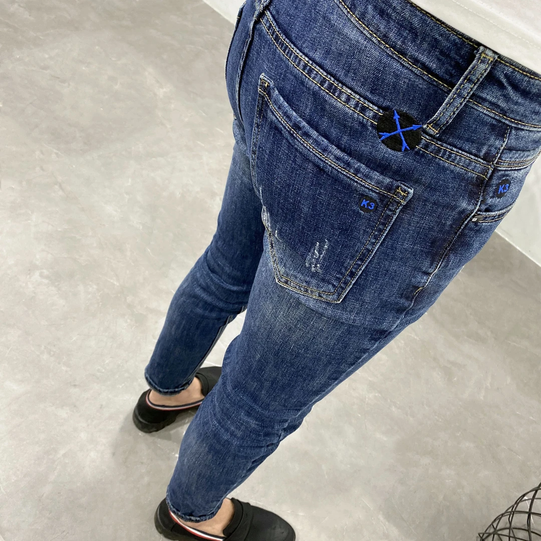 休闲流行男士牛仔裤刺绣水洗深蓝修身小脚韩版潮流弹力百搭长裤子