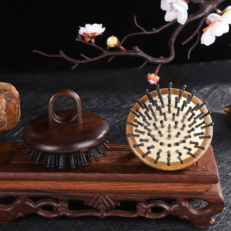 正品檀木指环黑水牛角钉钉梳多工能头疗按摩梳防静电脱发梳礼品梳