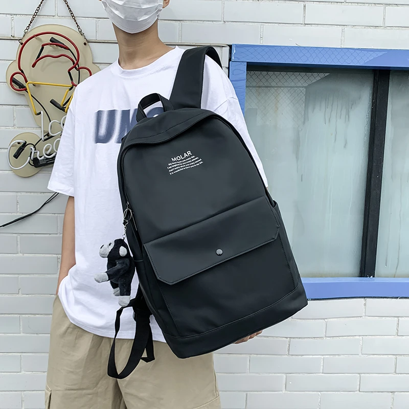 书包男休闲时尚潮流街头简约学院风背包女高中学生校园港风双肩包