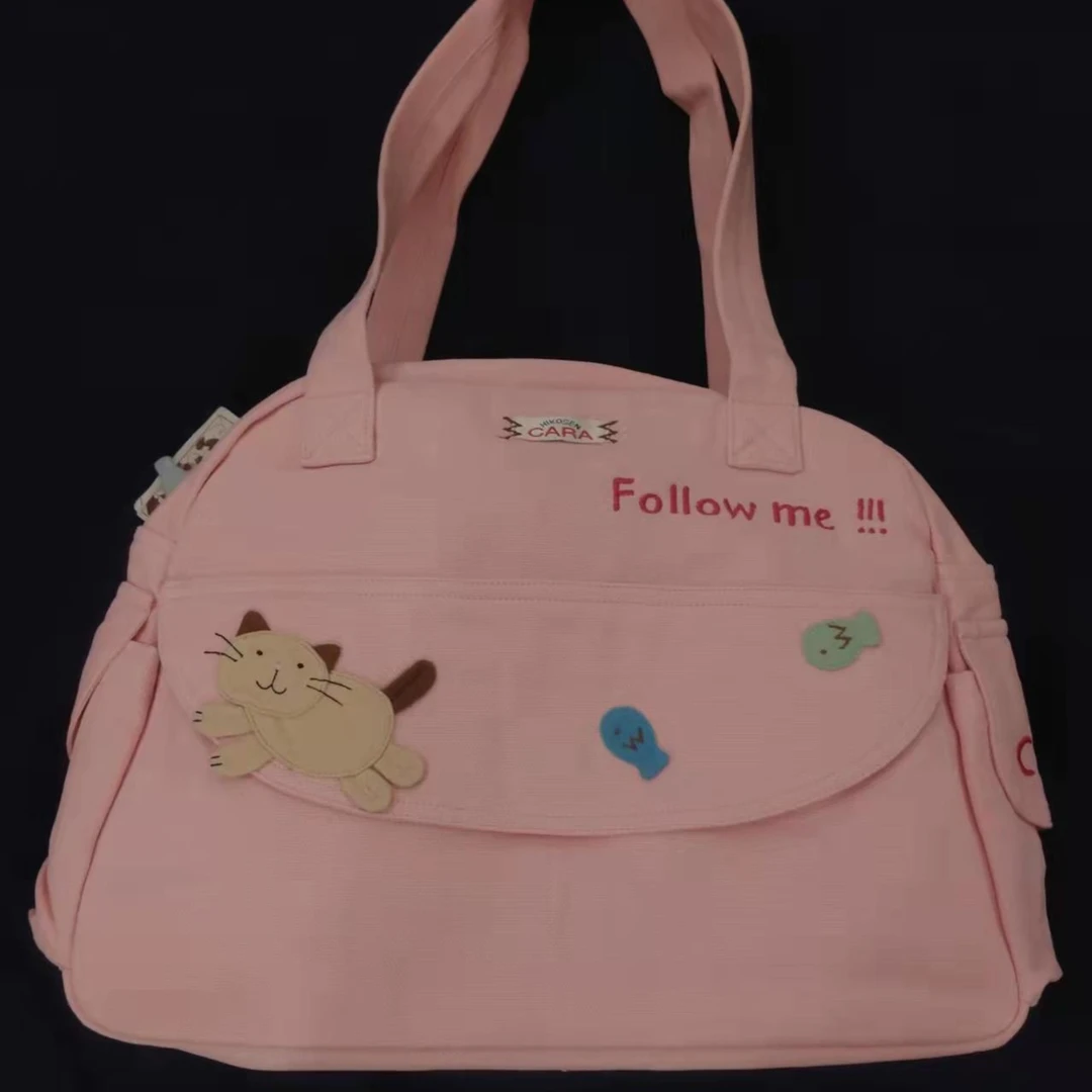 卡拉猫品牌休闲帆布手拎包，贴布猫猫非常好看。